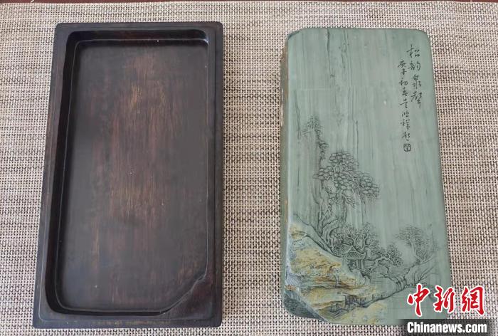 圖為盧保勝為提升洮硯文化內(nèi)涵，制作“一硯一銘、一盒一拓”成品展示?！堟?攝